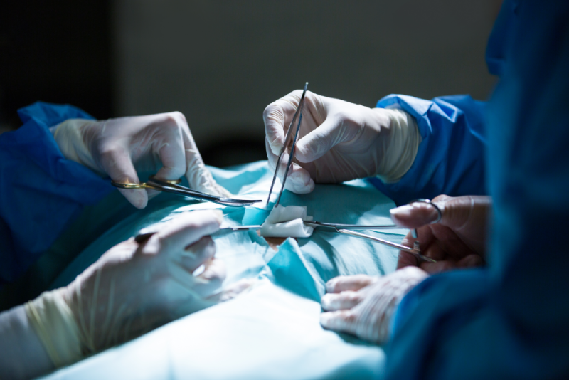 surgeons performing operation in operation room 1